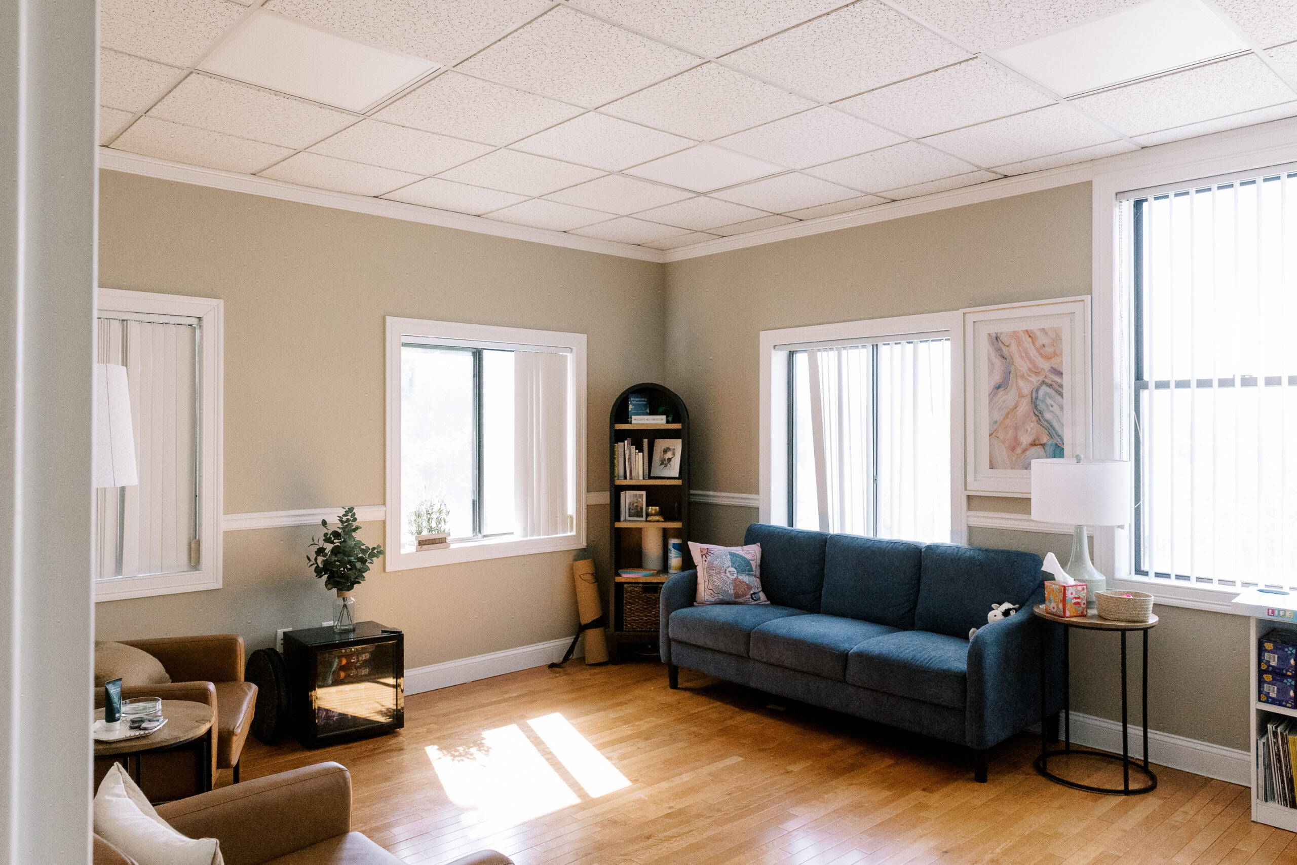 CMHS therapy room with comfortable seating and natural light